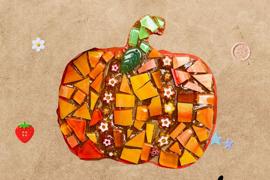 Promotional flyer for a 'Mosaic Pumpkin' event on Wednesday, October 14th from 7-8 PM at Back Door Craft Studio. The flyer features a colorful mosaic pumpkin made of orange, yellow, and green glass tiles in the center, set against a textured brown kraft paper background decorated with small colorful flowers and butterflies.
